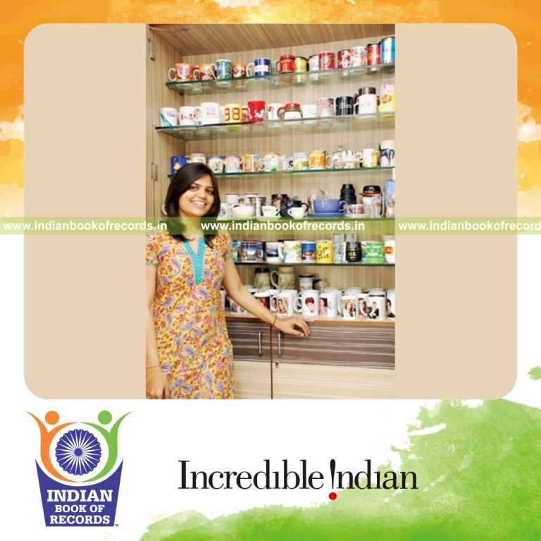 female individual collecting multiple coffee mugs for record in Indian Book of Records