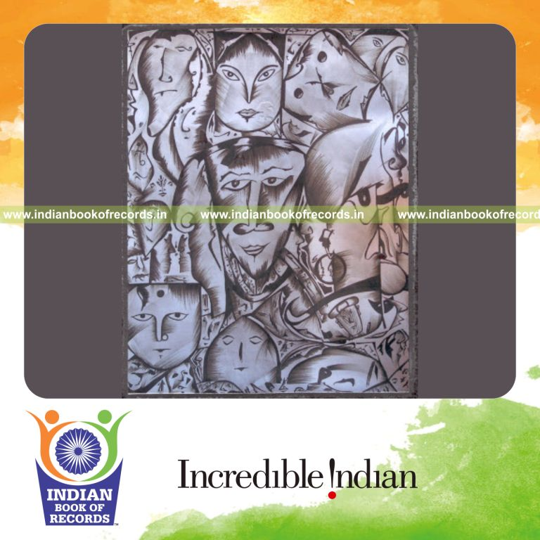 male artist painting multiple faces on an ivory sheet for record in Indian Book of Records