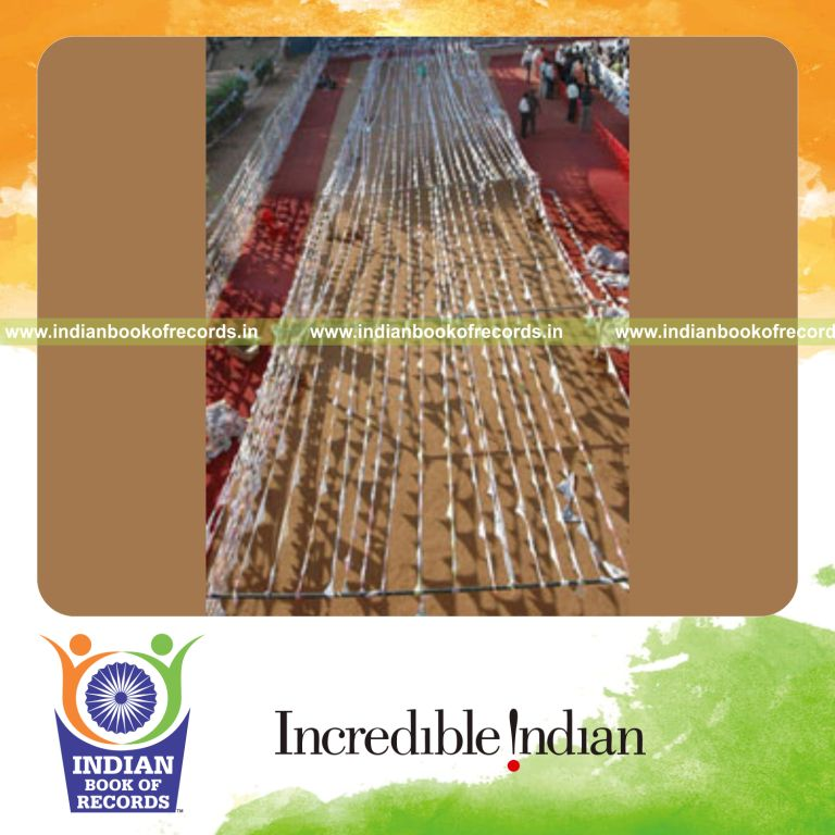 handkerchiefs connected together forming a long chain for record in Indian Book of Records