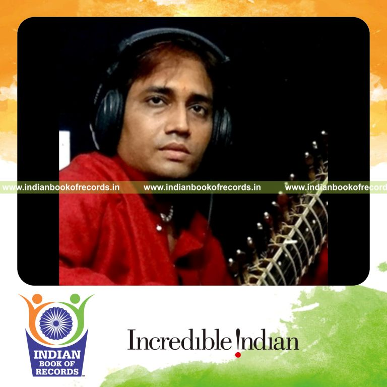 male individual composing multiple music pieces for record in Indian Book of Records