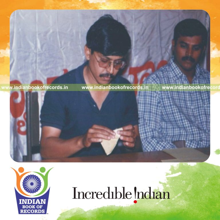 person making and flying many paper planes within one hour for Indian Book of Records