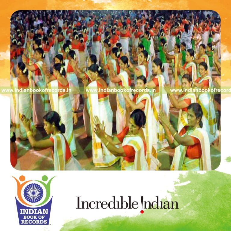 group of participants performing thiruvathira dance at single venue for record in Indian Book of Records