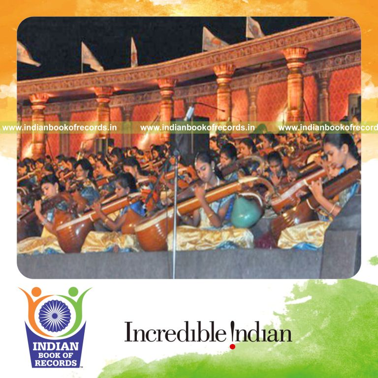 group of participants performing veena ensemble at single venue for record in Indian Book of Records