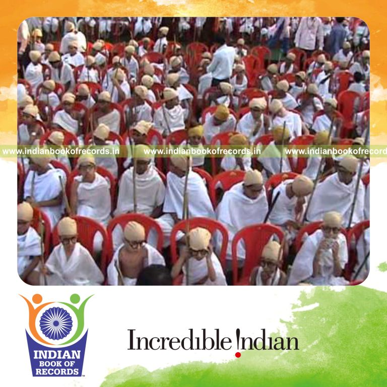 group of people dressed as mahatma gandhi simultaneously at single venue for record in an Indian Book of Records