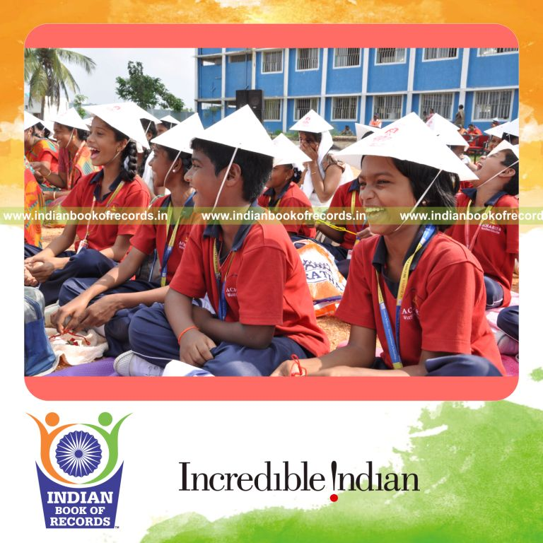 group of people laughing simultaneously at single venue for record in Indian Book of Records