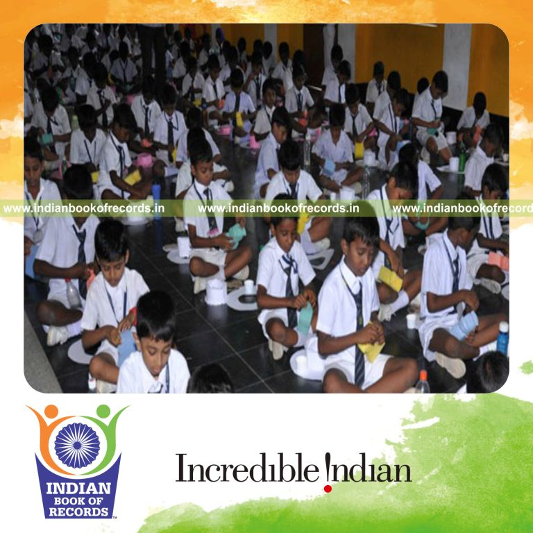 group of people making sponge dolls simultaneously at single venue for record in Indian Book of Records