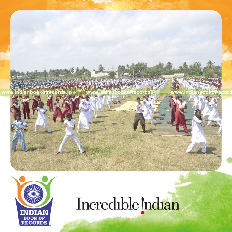 group of people performing taekwondo simultaneously at single venue for record in Indian Book of Records