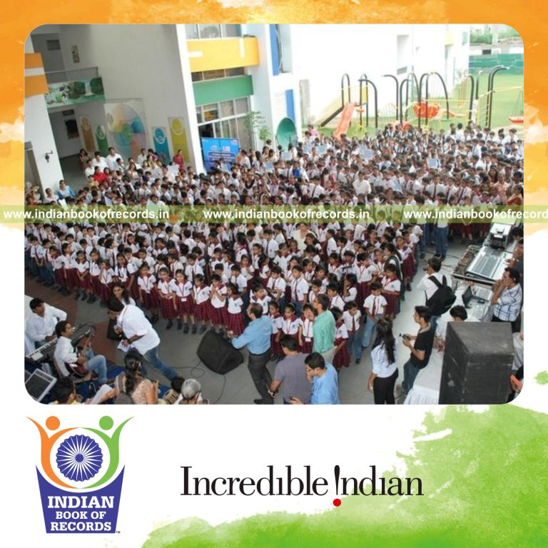 group of people singing live on radio for record in Indian Book of Records