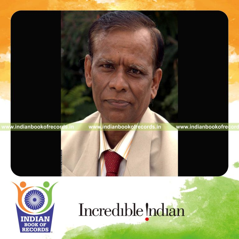 male individual receiving numerous regret slips as part of record achievement in Indian Book of Records