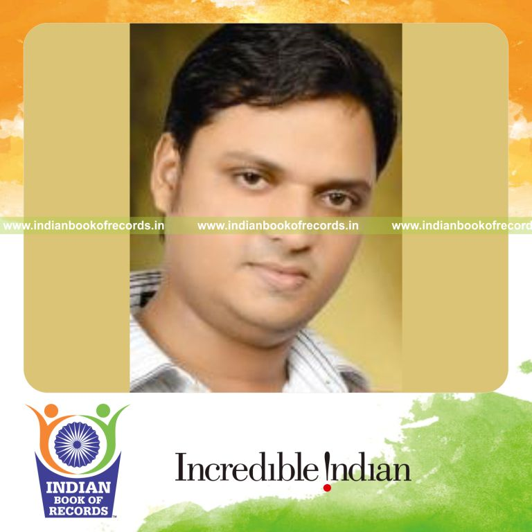 male individual writing large acknowledgement content for record in Indian Book of Records