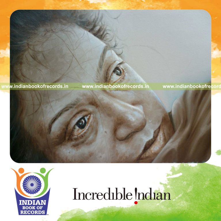 male artist creating multiple oil portraits of a single person for record in Indian Book of Records