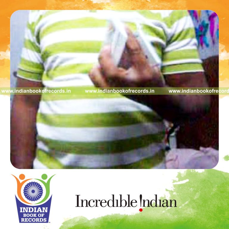 individual performing maximum one handed thumb cuts in 30 seconds for record in Indian Book of Records