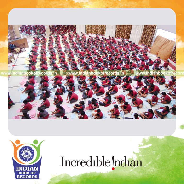 team creating and blowing origami paper balls for Indian Book of Records