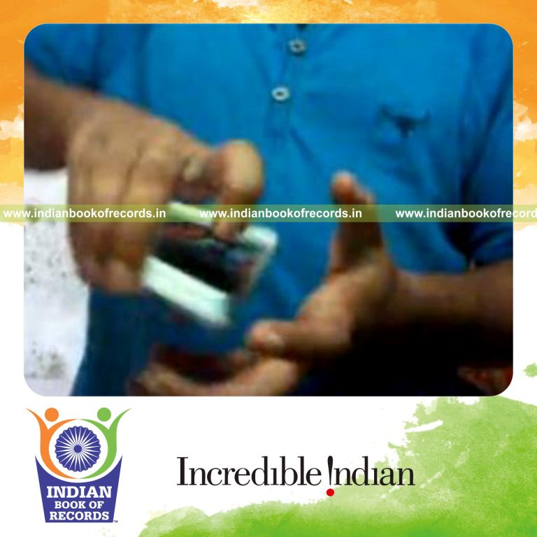 individual performing packet turnover card flourishes in 30 seconds for record in Indian Book of Records