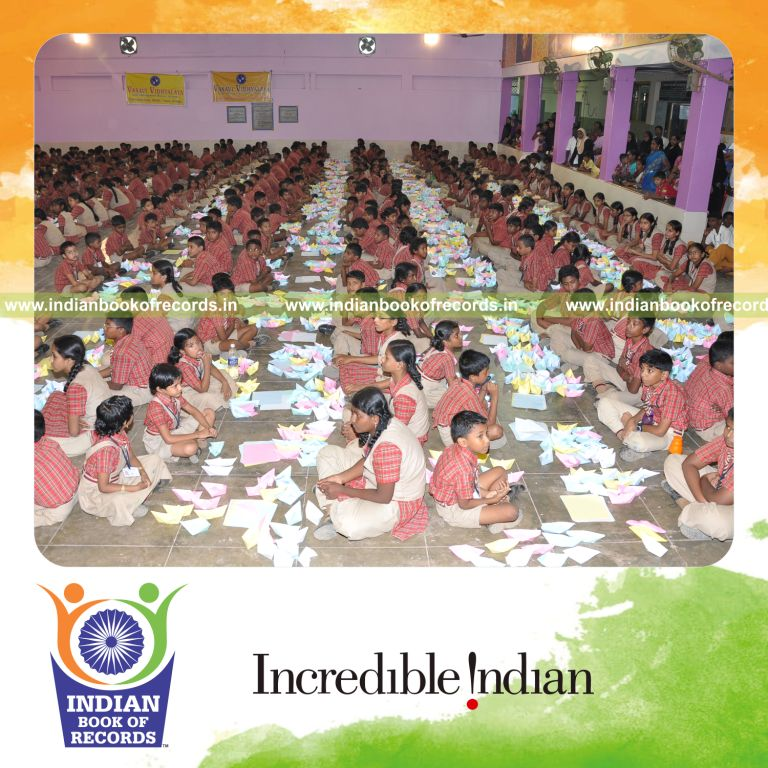 team making paper boats within ten minutes for record in Indian Book of Records