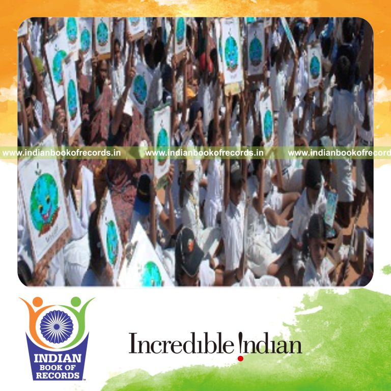 group of participants engaged in glass painting at a single venue for record in Indian Book of Records