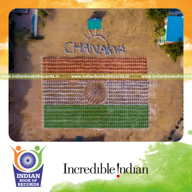 people performing a patriotic dance while forming the indian flag pattern in a coordinated event for a record in Indian Book of Records