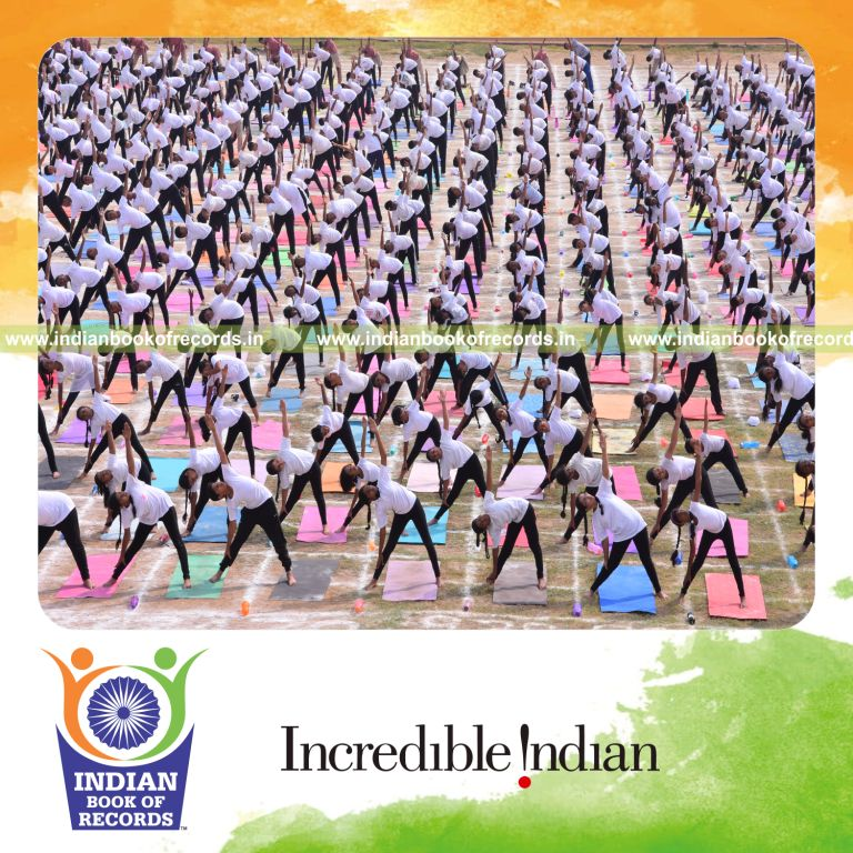 participants performing yogasanas simultaneously for one hour at single venue for Indian Book of Records