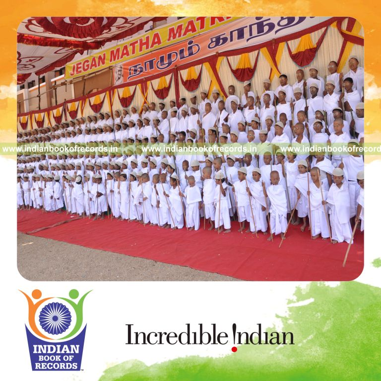group of people dressed as a mahatma gandhi simultaneously at single venue for record in an Indian Book of Records