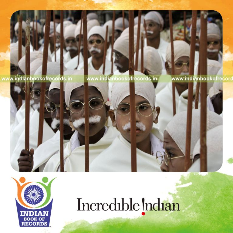 group of people dressed as a mahatma gandhi simultaneously at single venue for record in Indian Book of Records