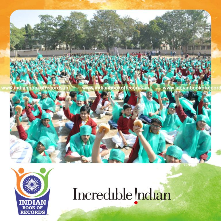 group of participants eating hot dogs simultaneously at single venue for Indian Book of Records