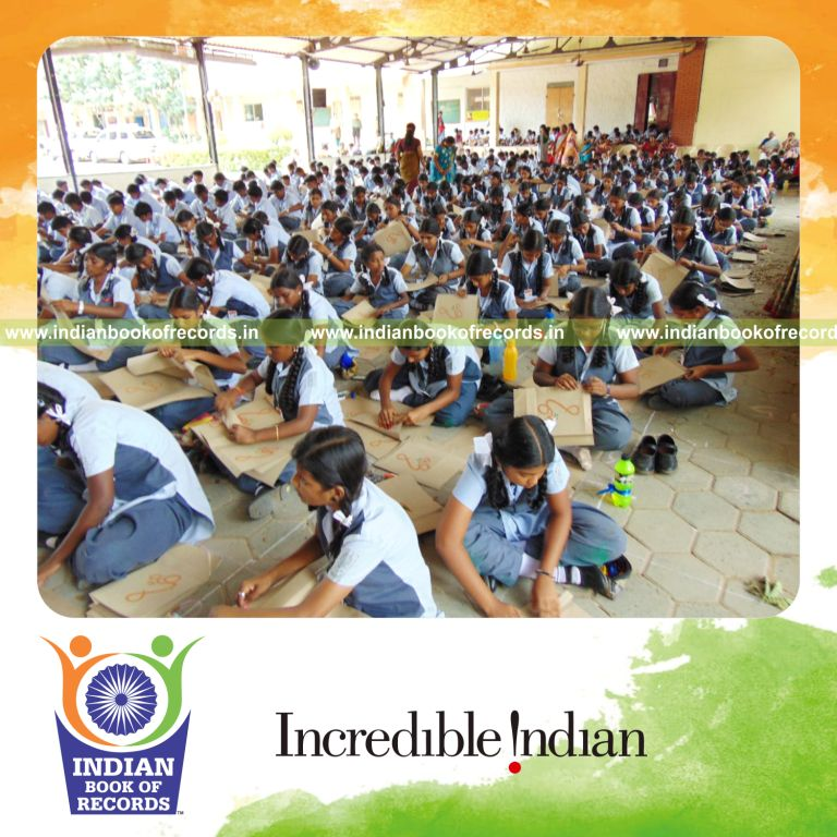 group making and coloring paper bags simultaneously at single venue for Indian Book of Records