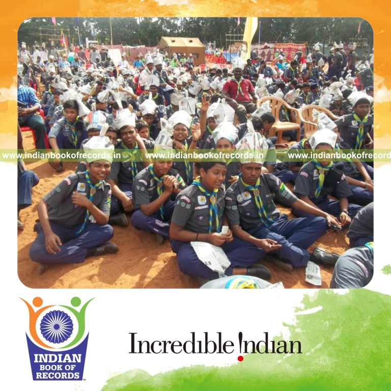 group wearing paper hats simultaneously at single venue for Indian Book of Records