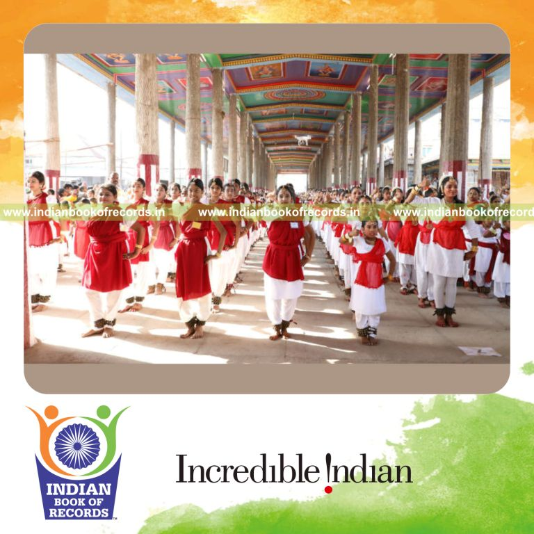 people performing bharatanatyam dance together at the same time in a coordinated cultural event for a record in Indian Book of Records