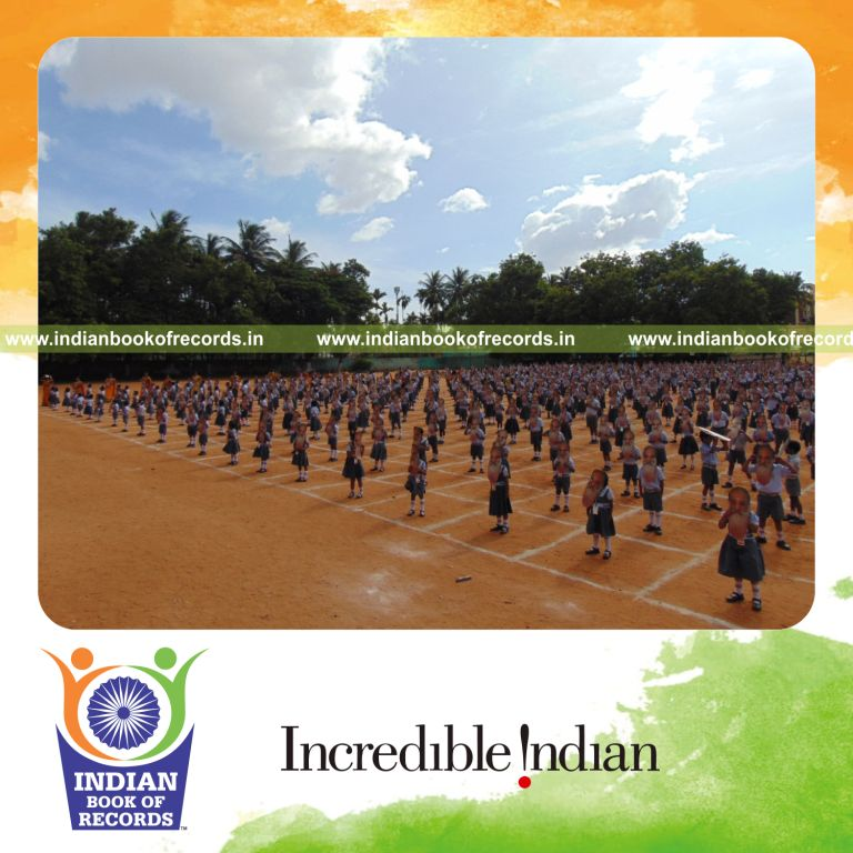 group wearing swami chinmayananda masks simultaneously at single venue for Indian Book of Records