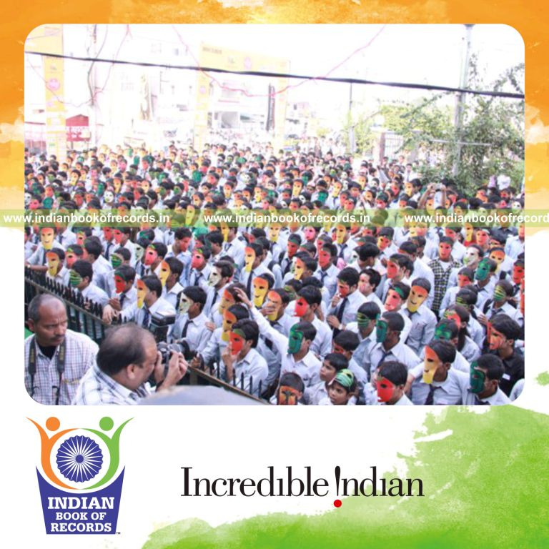 group of people wearing vegetable masks simultaneously during Indian Book of Records event