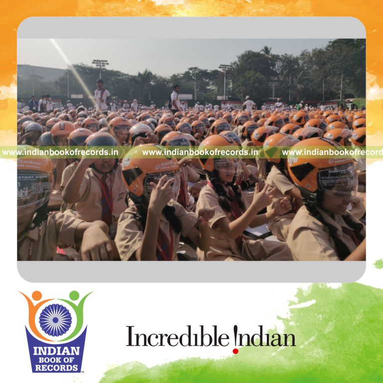 people wearing helmets together at the same time to promote safety awareness for a record in Indian Book of Records