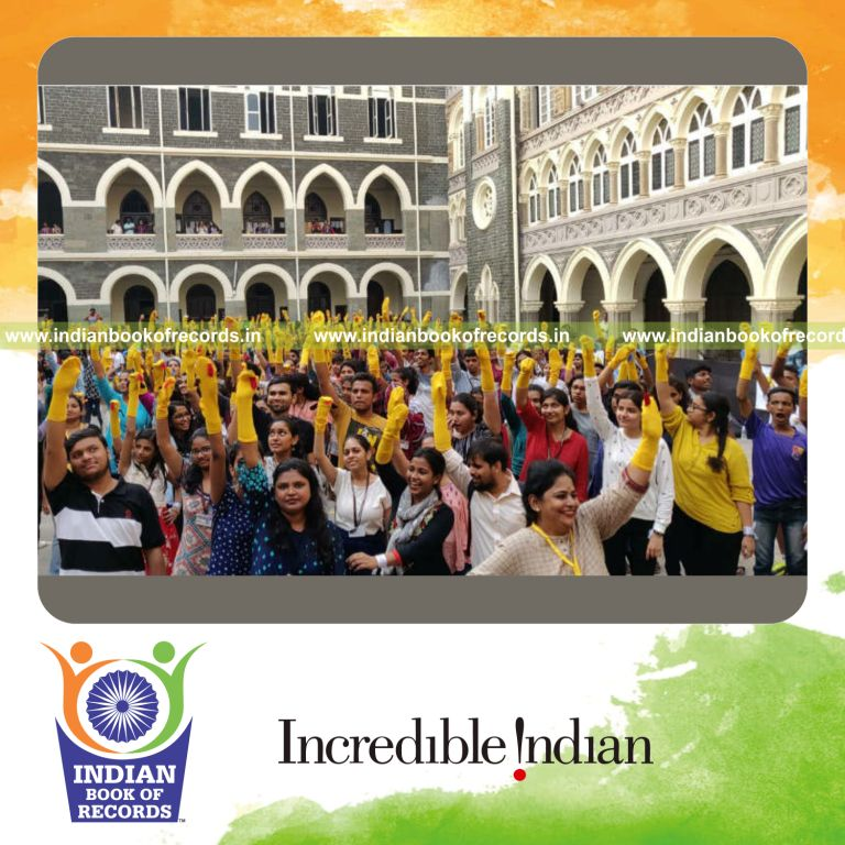 people wearing sock puppets together at the same time in a coordinated activity for a record in Indian Book of Records