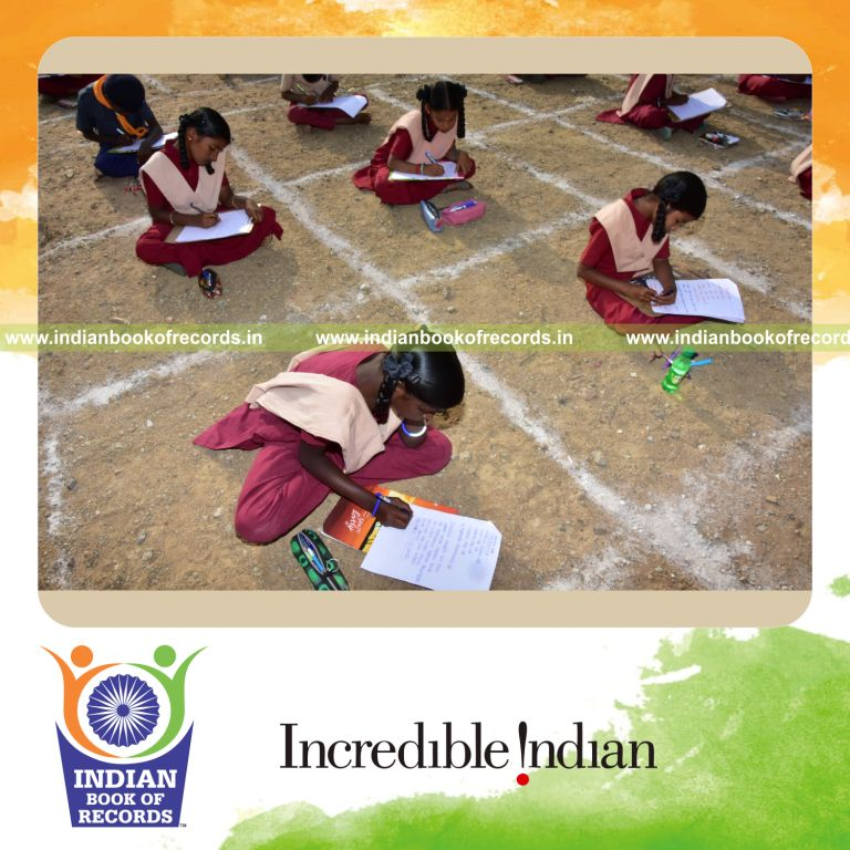 people writing laws of chemical combination together at the same time in a structured activity for a record in Indian Book of Records