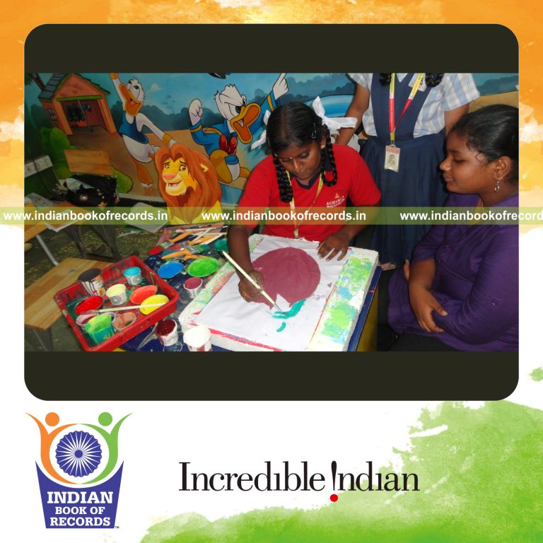 young female painting multiple pictures within ten hours for record in Indian Book of Records
