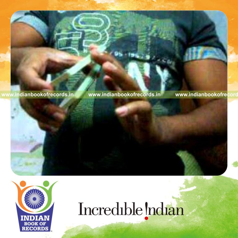 individual performing maximum pivot wave card cuts in 30 seconds for record in Indian Book of Records