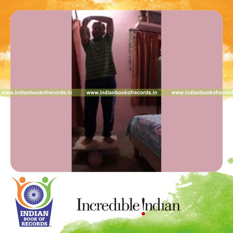 individual balancing poker chips on elbow and catching them while on rola bola for record in Indian Book of Records