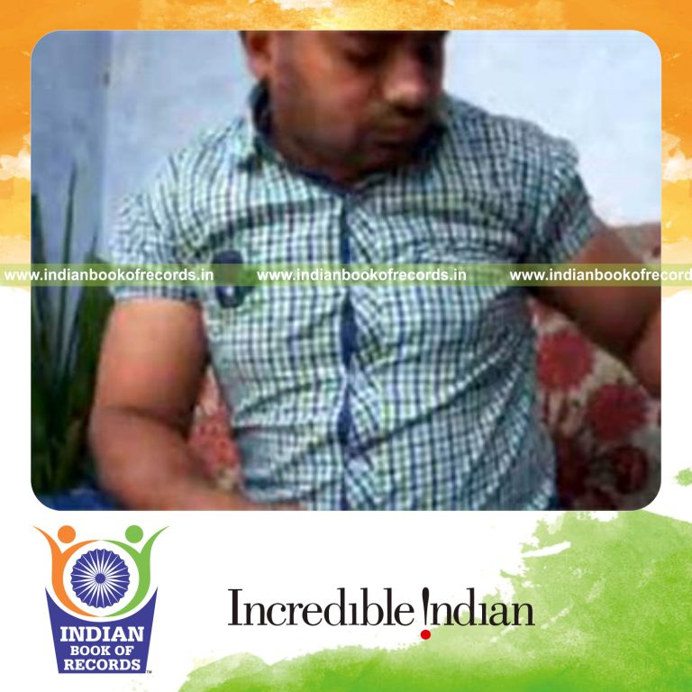individual performing revolution 2 and chen ka combinations while holding weight plates for record in Indian Book of Records