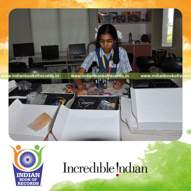 young female creating robotic models within ten hours for record in Indian Book of Records