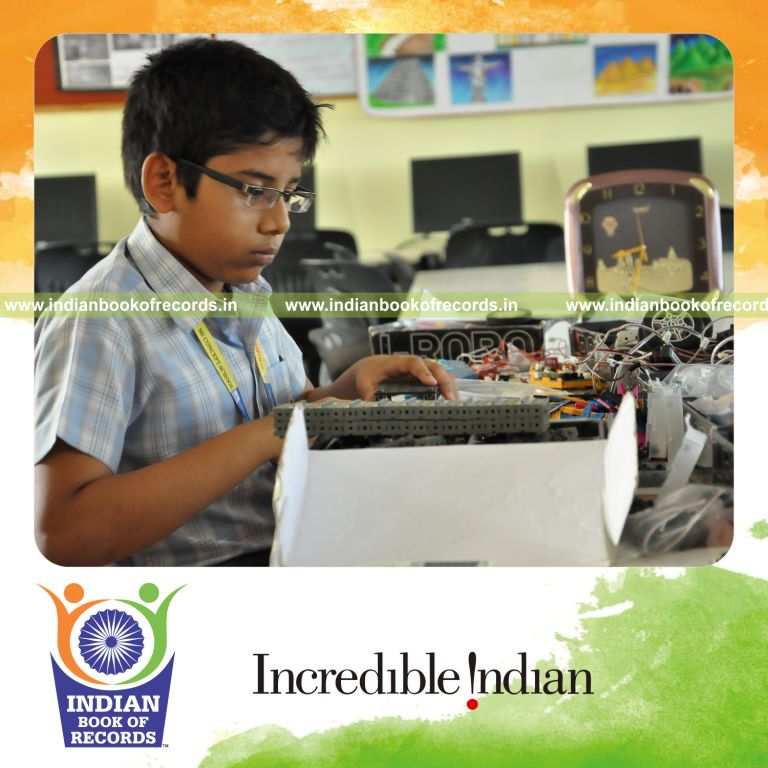 young male creating robotic models within ten hours for record in Indian Book of Records