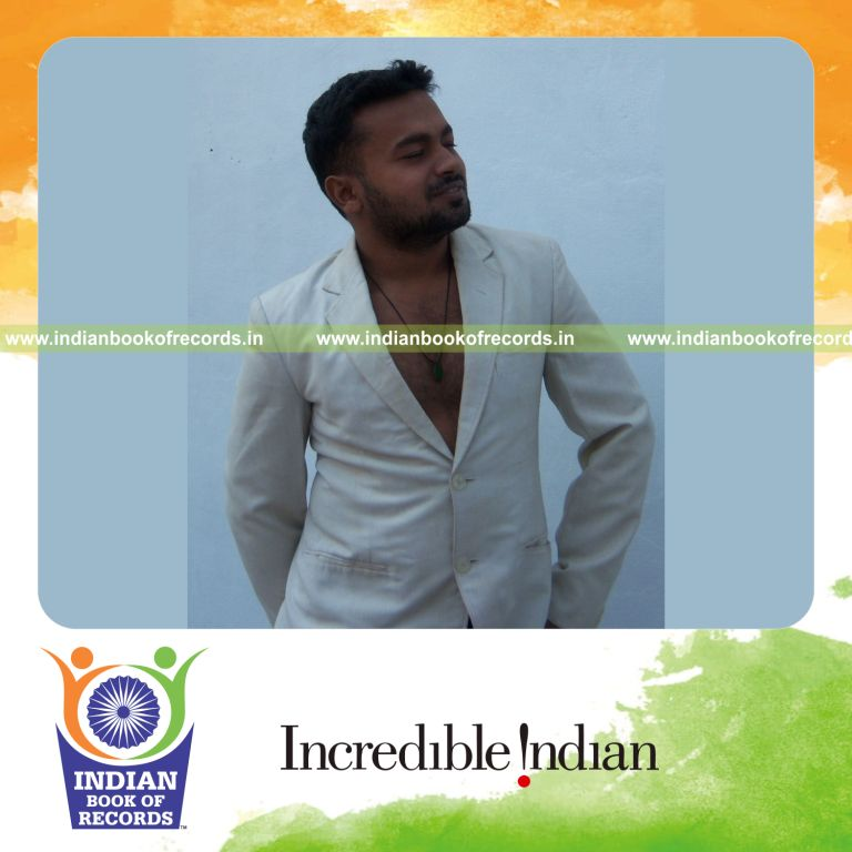 male performing rapid saber card cuts within one minute for Indian Book of Records