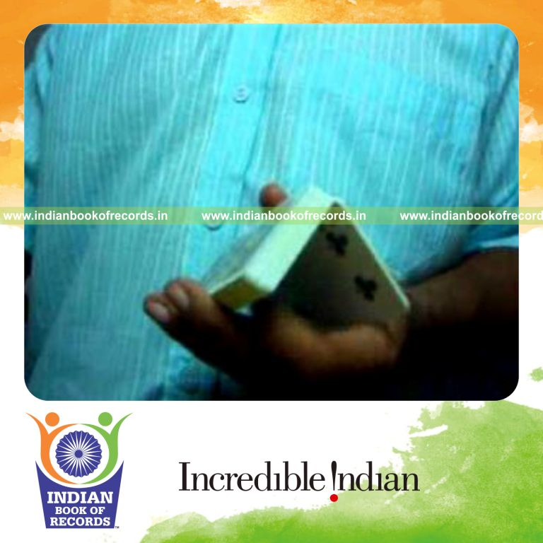 individual performing sabers double trouble card cuts in one minute for record in Indian Book of Records