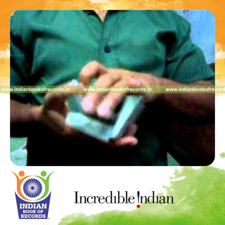 individual performing maximum sabers haya card cuts in one minute for record in Indian Book of Records