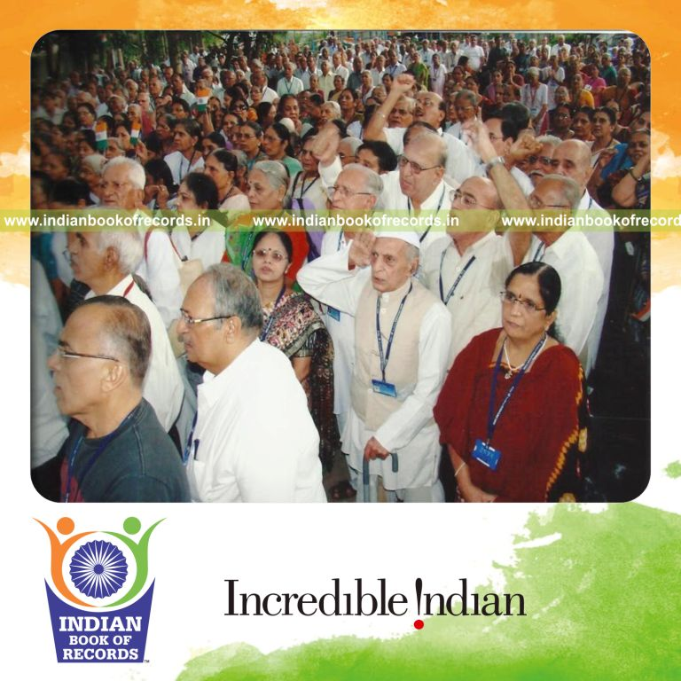 group of senior citizens singing national anthem simultaneously at single venue for record in Indian Book of Records