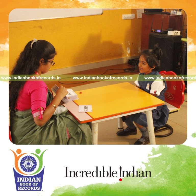 A young learner recalling numerous sight words from flashcards quickly recognized by Indian Book of Records