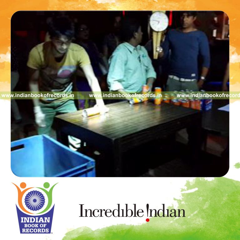 individual crushing soda cans using bare hand in one minute for record in Indian Book of Records