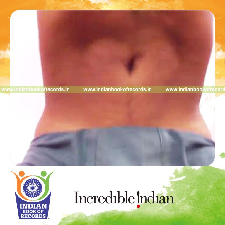 individual performing stomach rolls in 15 seconds for record in Indian Book of Records