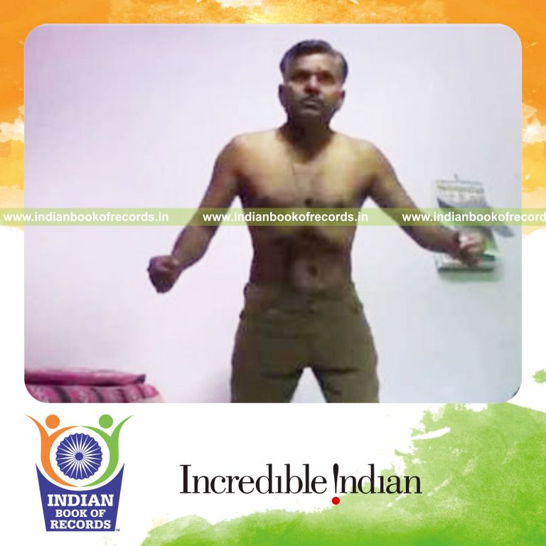 individual performing stomach rolls in six seconds for record in Indian Book of Records