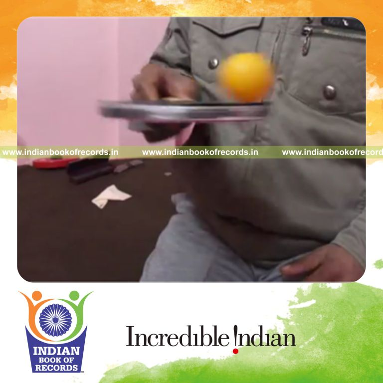 individual rotating table tennis ball on paddle surface for record in Indian Book of Records