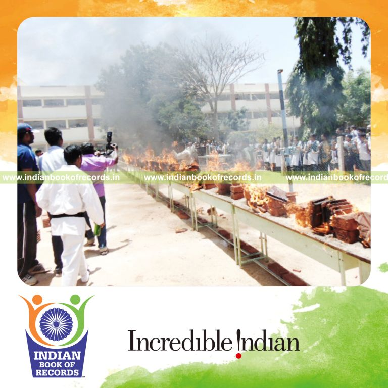minor male breaking burning tiles using shito blocks within 4 minutes for Indian Book of Records