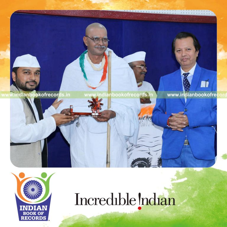 an individual performing the role of mahatma gandhi multiple times in events and presentations for a record in Indian Book of Records